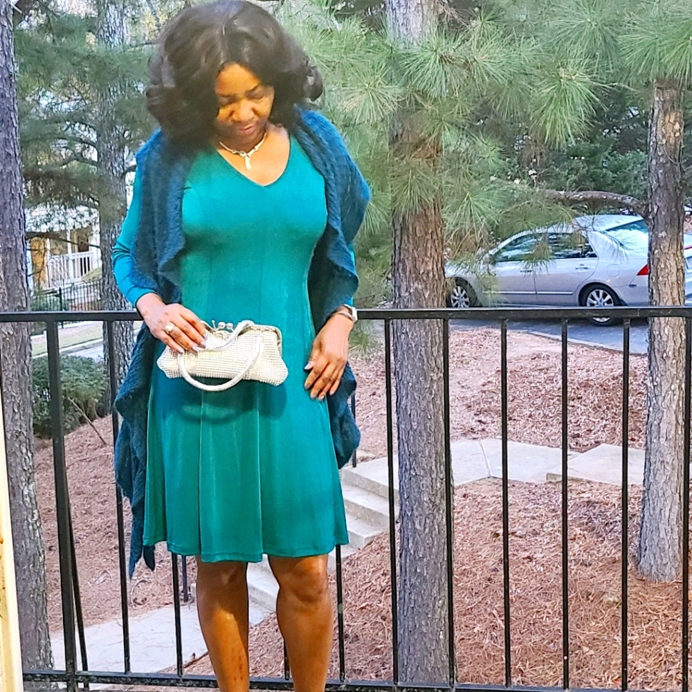Dress in Teal color.